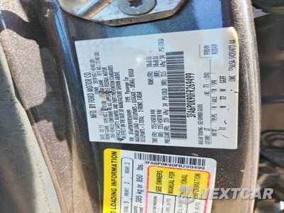 Zdjęcie 12 z 12 samochodu: 2015 FORD FUSION TITANIUM VIN:3FA6P0K90FR269499 - miniatura