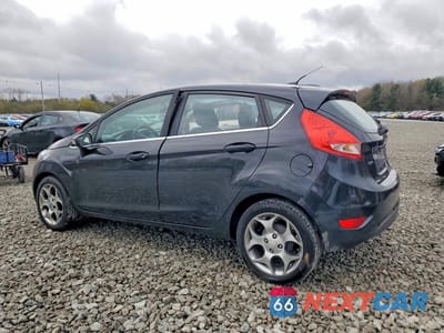 Drugie zdjęcie samochodu z przodu: 2011 FORD FIESTA VIN:3FADP4FJ5BM124260 - miniatura