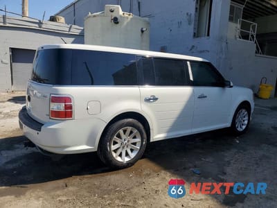 Trzecie zdjęcie samochodu z tyłu: 2009 FORD FLEX SEL VIN:2FMEK62C79BA89986 - miniatura