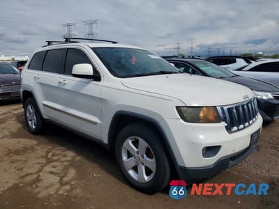 Czwarte zdjęcie samochodu z boku: 2011 JEEP GRAND CHEROKEE LAREDO VIN:1J4RS4GG2BC513452 - miniatura