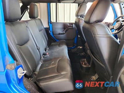 Zdjęcie 10 z 11 samochodu: 2015 JEEP WRANGLER UNLIMITED SAHARA VIN:1C4BJWEG8FL685189 - miniatura