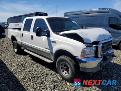 Czwarte zdjęcie samochodu z boku: 2002 FORD F350 SRW SUPER DUTY VIN:1FTSW31F72EC35559 - miniatura