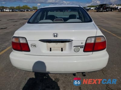 Zdjęcie 6 z 12 samochodu: 1996 HONDA ACCORD LX VIN:1HGCD5636TA213681 - miniatura