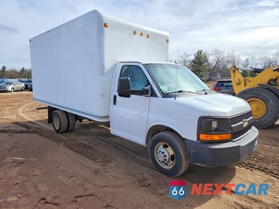 Czwarte zdjęcie samochodu z boku: 2014 CHEV EXPRESS G3500 VIN:1GB3G3CG5E1127495 - miniatura