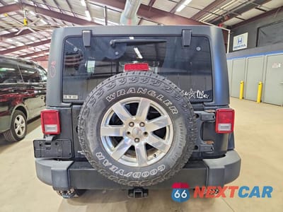 Zdjęcie 6 z 14 samochodu: 2017 JEEP WRANGLER UNLIMITED SAHARA VIN:1C4HJWEG4HL521385 - miniatura