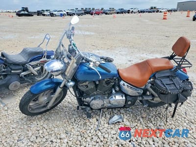 Trzecie zdjęcie samochodu z tyłu: 2004 HONDA VTX1300 C VIN:1HFSC55054A002211 - miniatura