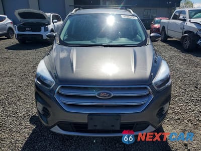 Piąte zdjęcie samochodu w środku: 2017 FORD ESCAPE TITANIUM VIN:1FMCU9JD7HUD77500 - miniatura