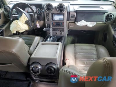 Zdjęcie 8 z 12 samochodu: 2004 HUMMER H2 VIN:5GRGN23U64H111278 - miniatura