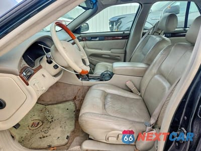 Zdjęcie 7 z 12 samochodu: 1999 CADILLAC SEVILLE STS VIN:1G6KY5494XU933364 - miniatura