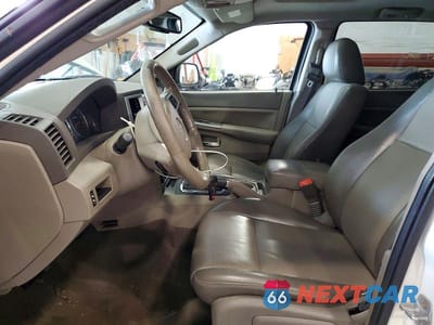 Zdjęcie 7 z 12 samochodu: 2010 JEEP GRAND CHEROKEE LAREDO VIN:1J4PR4GK7AC148983 - miniatura