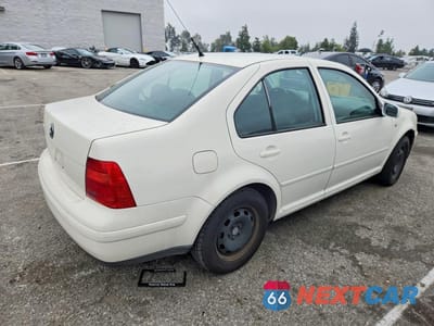 Trzecie zdjęcie samochodu z tyłu: 2003 VOLKSWAGEN JETTA GL VIN:3VWRK69M23M044526 - miniatura