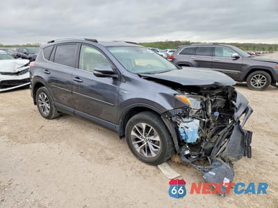 Czwarte zdjęcie samochodu z boku: 2017 TOYOTA RAV4 HYBRID XLE VIN:JTMRJREV6HD080986 - miniatura