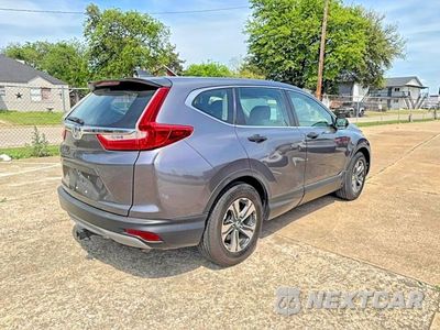 Czwarte zdjęcie samochodu z boku: 2018 HONDA CR-V LX VIN:2HKRW5H33JH418560 - miniatura