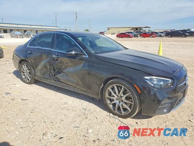 Czwarte zdjęcie samochodu z boku: 2022 MERCEDES-BENZ E 350 VIN:W1KZF8DB8NB087454 - miniatura