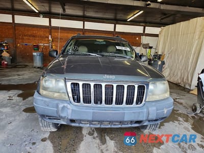 Piąte zdjęcie samochodu w środku: 2002 JEEP GRAND CHEROKEE LAREDO VIN:1J4GW48SX2C232806 - miniatura