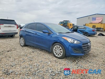 Czwarte zdjęcie samochodu z boku: 2016 HYUNDAI ELANTRA GT BASE VIN:KMHD35LH6GU265849 - miniatura