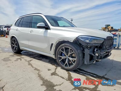 Czwarte zdjęcie samochodu z boku: 2021 BMW X5 XDRIVE40I VIN:5UXCR6C06M9F85297 - miniatura