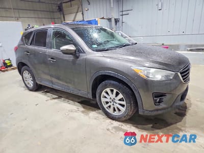 Czwarte zdjęcie samochodu z boku: 2016 MAZDA CX-5 TOURING VIN:JM3KE2CY7G0779194 - miniatura
