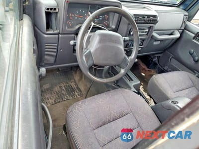 Zdjęcie 8 z 12 samochodu: 2002 JEEP WRANGLER / TJ SPORT VIN:1J4FA49S92P743764 - miniatura
