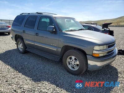 Czwarte zdjęcie samochodu z boku: 2001 CHEVROLET TAHOE K1500 VIN:1GNEK13T31R191090 - miniatura