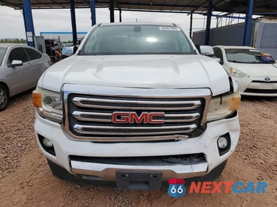 Piąte zdjęcie samochodu w środku: 2016 GMC CANYON SLT VIN:1GTG5DE31G1127791 - miniatura