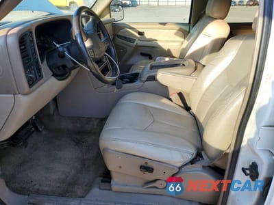 Zdjęcie 7 z 13 samochodu: 2003 CHEVROLET SUBURBAN K1500 VIN:3GNFK16Z43G140561 - miniatura