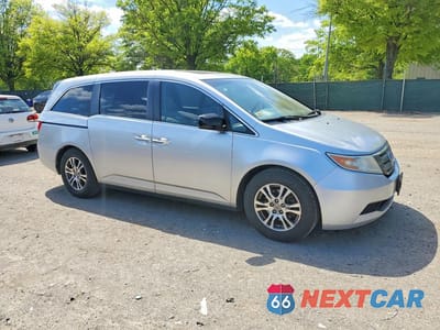 Czwarte zdjęcie samochodu z boku: 2011 HONDA ODYSSEY EXL VIN:5FNRL5H64BB085594 - miniatura