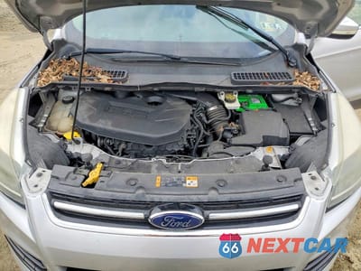 Zdjęcie 12 z 13 samochodu: 2013 FORD ESCAPE TITANIUM VIN:1FMCU9J90DUD63315 - miniatura