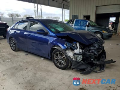 Czwarte zdjęcie samochodu z boku: 2022 KIA FORTE LXS VIN:3KPF24AD5NE467099 - miniatura