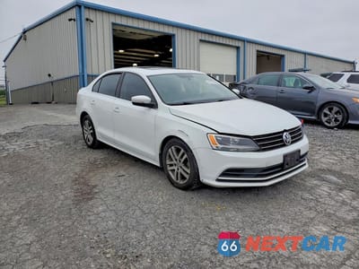 Czwarte zdjęcie samochodu z boku: 2015 VOLKSWAGEN JETTA TDI VIN:3VWLA7AJ0FM340424 - miniatura