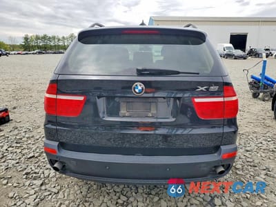 Zdjęcie 6 z 13 samochodu: 2009 BMW M5 VIN:5UXFE43569L267647 - miniatura