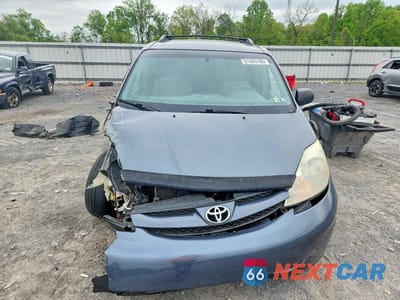 Piąte zdjęcie samochodu w środku: 2010 TOYOTA SIENNA LE 7-PASSENGER VIN:5TDKK4CC4AS330173 - miniatura