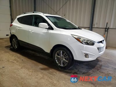 Czwarte zdjęcie samochodu z boku: 2014 HYUNDAI TUCSON SE VIN:KM8JUCAG5EU944569 - miniatura