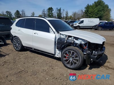 Czwarte zdjęcie samochodu z boku: 2026 BMW X5 XDRIVE50E VIN:5UX43EU04T9368325 - miniatura
