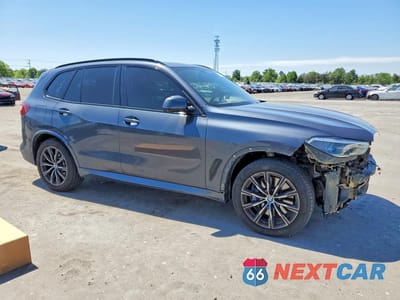 Czwarte zdjęcie samochodu z boku: 2020 BMW X5 M50I VIN:5UXJU4C0XL9D04157 - miniatura