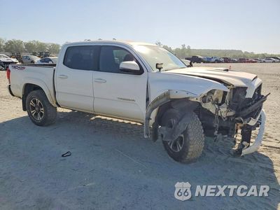 Czwarte zdjęcie samochodu z boku: 2019 TOYOTA TACOMA TRD SPORT VIN:3TMCZ5AN4KM221675 - miniatura