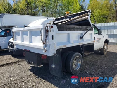 Czwarte zdjęcie samochodu z boku: 2001 FORD F450 SUPER DUTY DUMP TRUCK VIN:1FDXF47F31ED15583 - miniatura