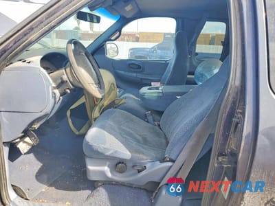 Zdjęcie 7 z 12 samochodu: 1999 FORD F-150 VIN:1FTRX17L2XKB33706 - miniatura