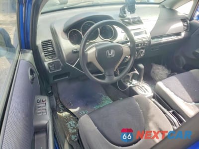 Zdjęcie 8 z 13 samochodu: 2007 HONDA FIT VIN:JHMGD38417S802906 - miniatura