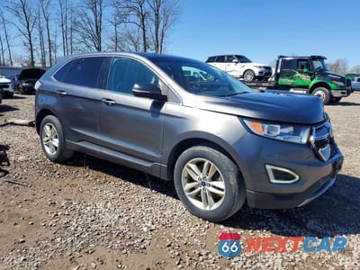 Czwarte zdjęcie samochodu z boku: 2016 FORD EDGE VIN:2FMPK4J81GBB19359 - miniatura