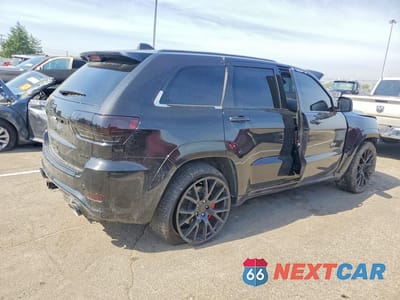 Trzecie zdjęcie samochodu z tyłu: 2015 JEEP GRAND CHEROKEE SRT-8 VIN:1C4RJFDJ9FC751986 - miniatura