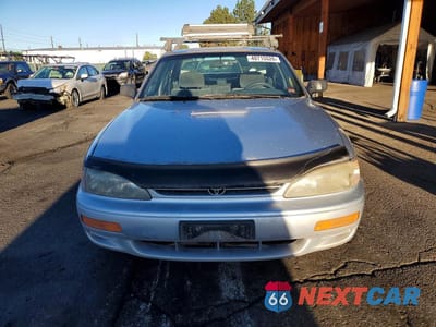 Piąte zdjęcie samochodu w środku: 1996 TOYOTA CAMRY DX VIN:JT2BG12K9T0385631 - miniatura