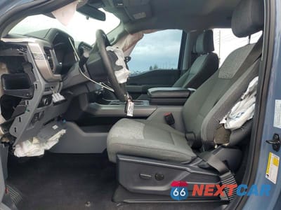 Zdjęcie 7 z 12 samochodu: 2023 FORD F150 LIGHTNING XLT VIN:1FTVW1EL6PWG12773 - miniatura