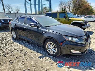 Czwarte zdjęcie samochodu z boku: 2012 KIA OPTIMA LX VIN:KNAGM4A72C5292521 - miniatura