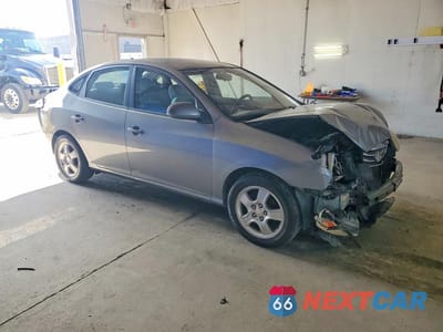 Czwarte zdjęcie samochodu z boku: 2010 HYUNDAI ELANTRA GLS VIN:KMHDU4AD6AU103055 - miniatura