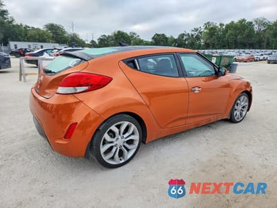Trzecie zdjęcie samochodu z tyłu: 2012 HYUNDAI VELOSTER BASE VIN:KMHTC6AD6CU030136 - miniatura