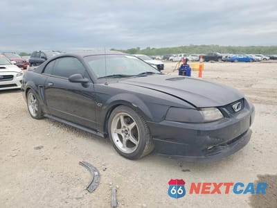 Czwarte zdjęcie samochodu z boku: 2000 FORD MUSTANG GT VIN:1FAFP42X2YF216440 - miniatura