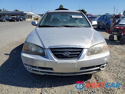 Piąte zdjęcie samochodu w środku: 2004 HYUNDAI ELANTRA GLS VIN:KMHDN46D64U819609 - miniatura