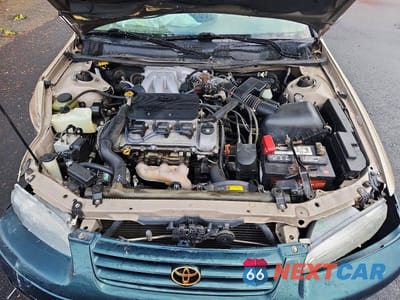 Zdjęcie 11 z 12 samochodu: 1999 TOYOTA CAMRY LE V6 VIN:JT2BF28K5X0220245 - miniatura