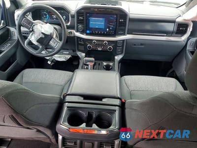 Zdjęcie 8 z 12 samochodu: 2023 FORD F150 LIGHTNING XLT VIN:1FTVW1EL6PWG12773 - miniatura